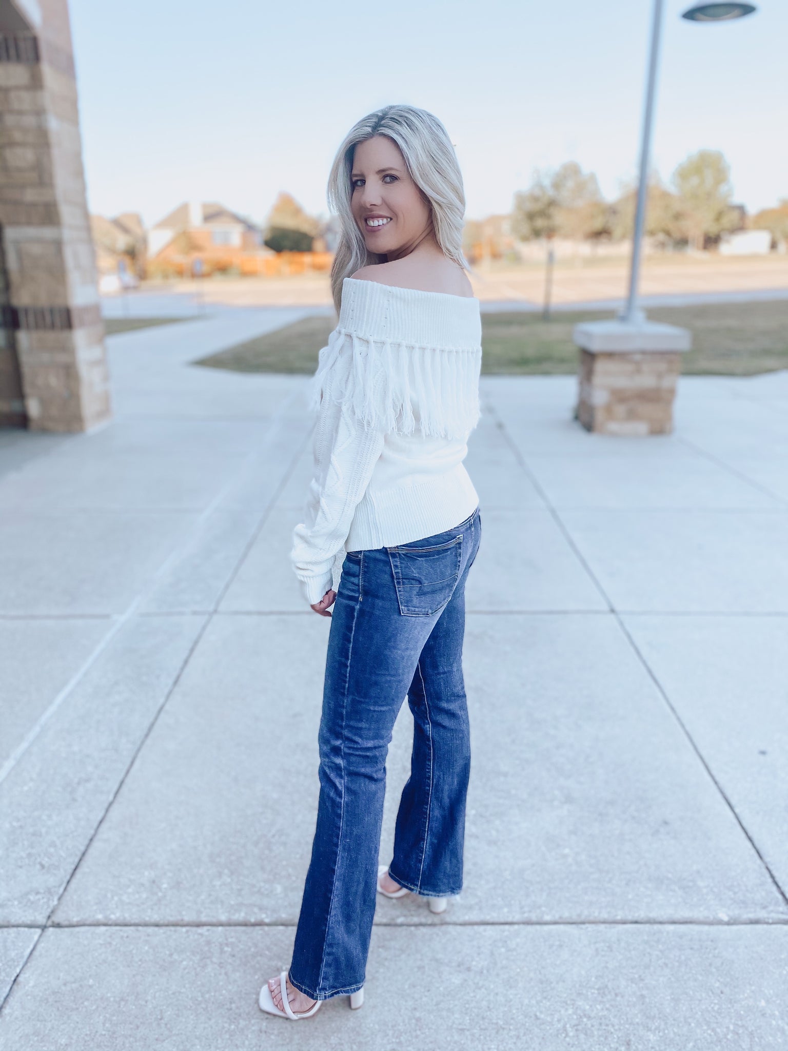 Off the shoulder sweater with fringe best sale